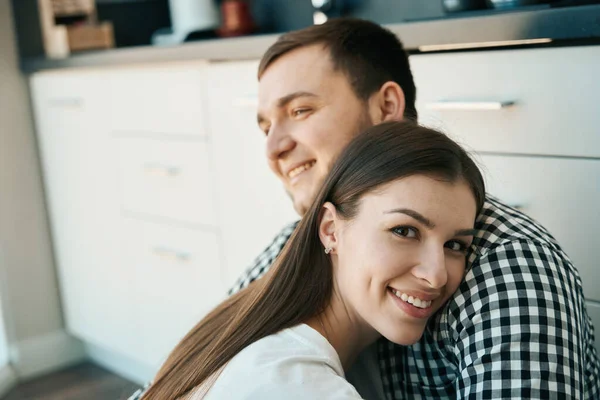 Happy Man Woman Sitting Gently Embracing Floor Kitchen Male Plaid — Stock Photo, Image