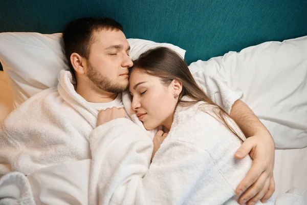 Married Couple Sleeps Sweetly Each Others Arms Woman Sleeps Mans — Stock Photo, Image