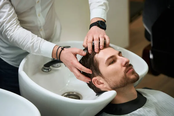 Hairdresser Barbershop Washes Hair Young Man Client Located Special Chair — Stock Photo, Image