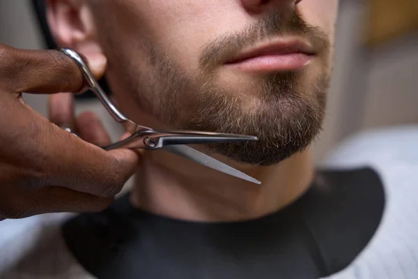 African American Barber Cuts Caucasian Beard Client Master Uses Special — Stock Photo, Image