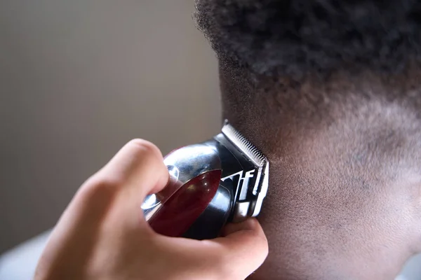 Hairdresser Uses Modern Clipper Edging Back His Head His African — Stock Photo, Image