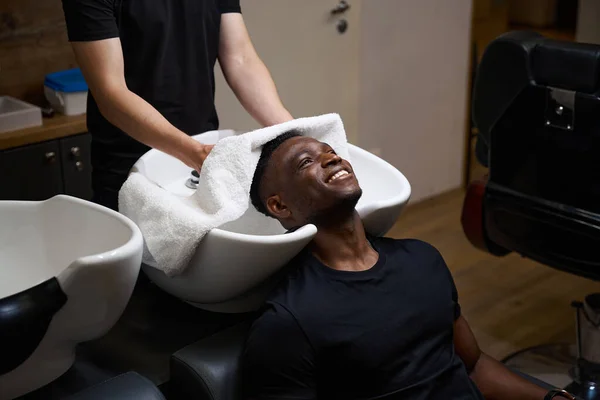 Caucasian Barber Dries Clients Hair Soft Towel African American Guy — Stock Photo, Image