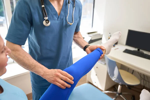 Rehabilitation Specialist Working Patient Leg Straightening Massaging Adjusting Joint Professional — Stock Photo, Image