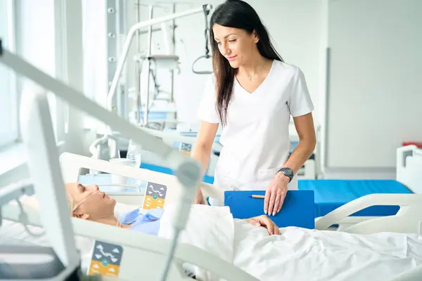 Caring Nurse Encourages Lady Surgery Patient Lies Special Postoperative Bed — Stock Photo, Image