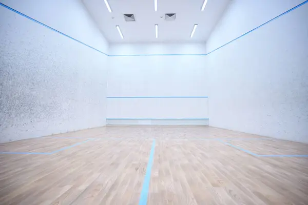 Empty indoor squash or tennis court interior in white colors copy space for promotional text
