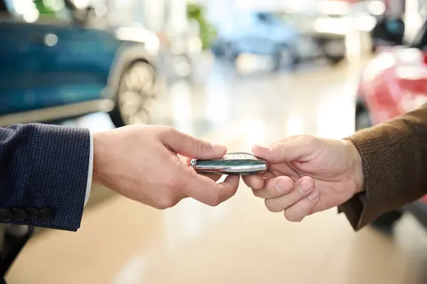 Male Buyer Takes New Keys His New Car Car Salesman — Stock Photo, Image