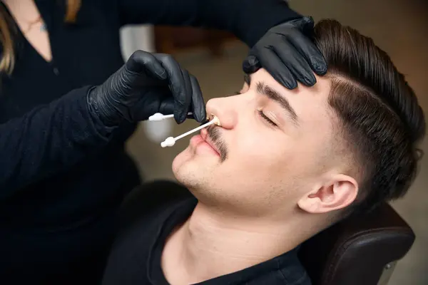 Unrecognizable Master Barber Removes Hair Nose Man Wax Barbershop — Stock Photo, Image