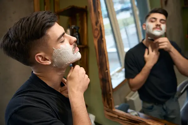 Handsome Man Hairdresser Shaving While Looking Mirror Barbershop — Stock Photo, Image