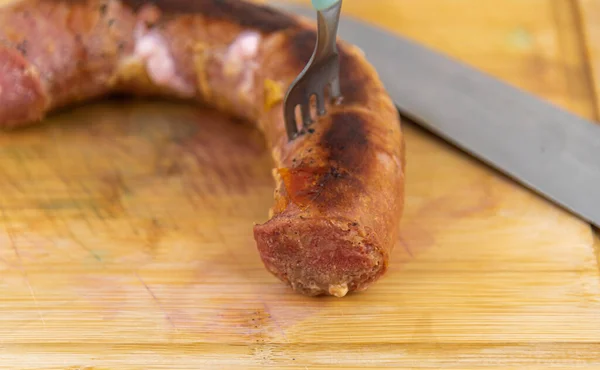 stock image Roasted sausage served a la carte. Embedded foods. Brazillian tipical food.