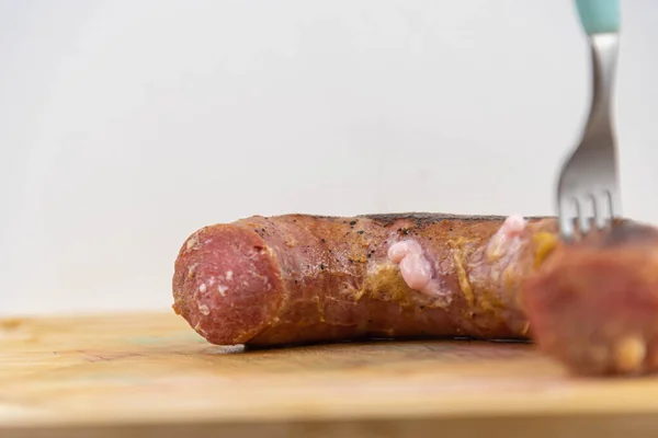 stock image Roasted sausage served a la carte. Embedded foods. Brazillian tipical food.