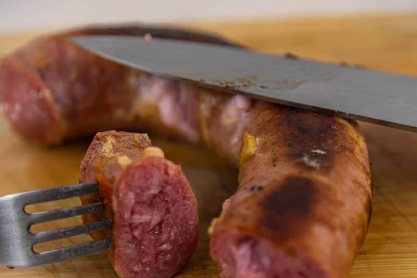 stock image Roasted sausage served a la carte. Embedded foods. Brazillian tipical food.