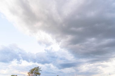 Rain clouds and cumulonimbus clouds over the pampa biome. clipart