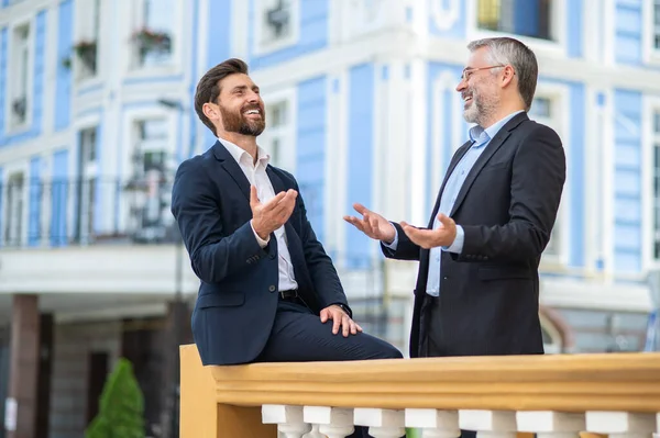 stock image Business issues. Two men discussing business issues and looking involved