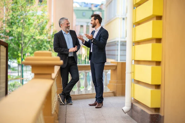 stock image Business talk. Two businessmen having a conversation