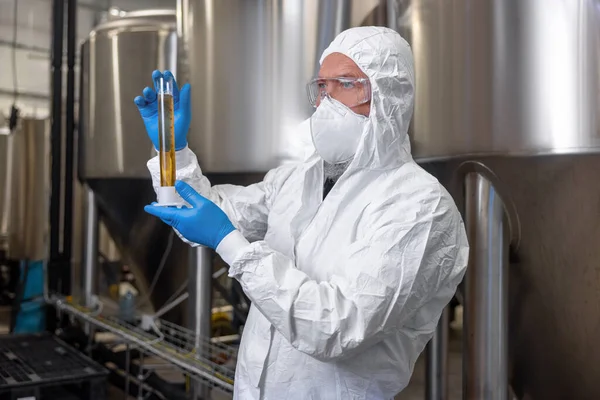 Waist Portrait Serious Brewer Holding Graduated Cylinder His Hands Looking — Foto Stock