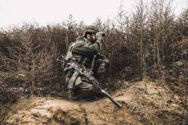 War time. Military reconnoiter investigating the place