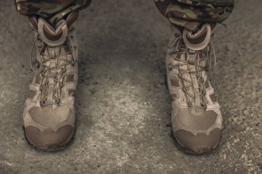 Feet in boots. Close up picture of soldiers feet in boots