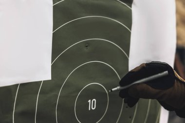 Target. Soldier marking the target for shooting