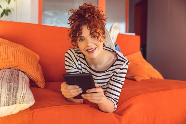 Leisure Ginger Girl Looking Relaxed Spending Time Online — Stockfoto