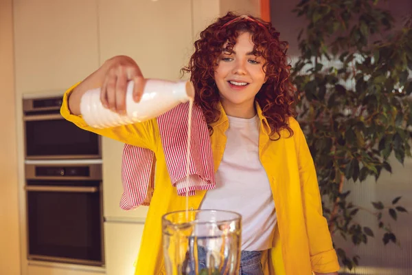 Making Smoothie Smiling Curly Haired Girl Pouring Milk Shaker — Stok fotoğraf