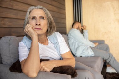 Conflict. Couple looking upset and stressed after the argument