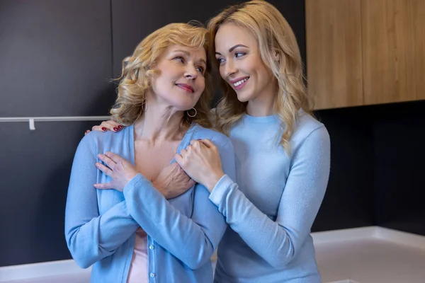 Waist Portrait Loving Young Blonde Woman Embracing Her Female Parent — Stock Photo, Image
