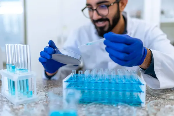 Bearded Smiling Scientist Man Eyeglasses Surgical Gloves Testing Chemical Sample — Stock Photo, Image