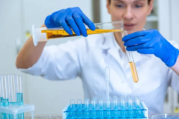 Woman Biologist Holding Test Tubes Pouring Yellow Liquid Flask Concentrated — Stock Photo, Image