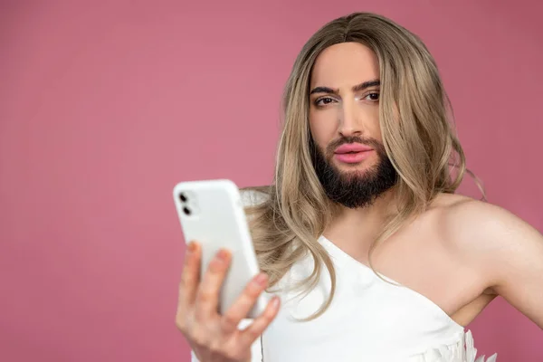 Serious Beautiful Transgender Wearing Blonde Wig White Dress Holding Mobile — Stock Photo, Image