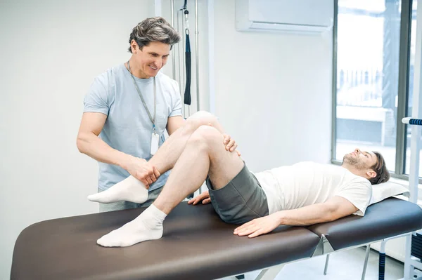 Legs Rehabilitation Male Physical Therapist Working Patients Legs — Stock Photo, Image