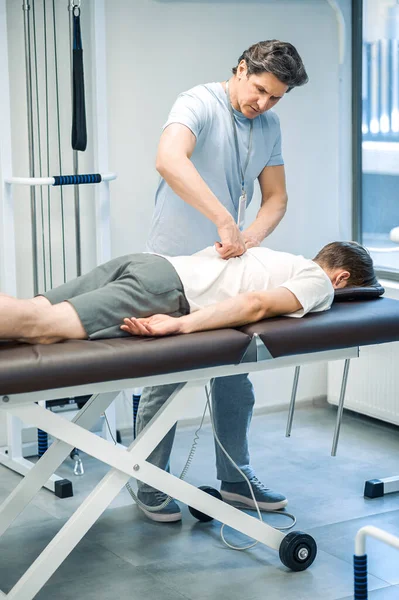 Back Rehabilitation Manual Therapist Working Patient Back Looking Involved — Stock Photo, Image