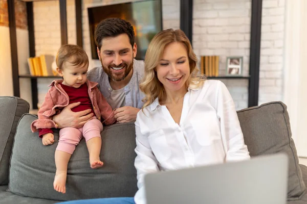 Father Playing Toddler Daughter While Looking Woman Laptop Having Video — Stock Photo, Image