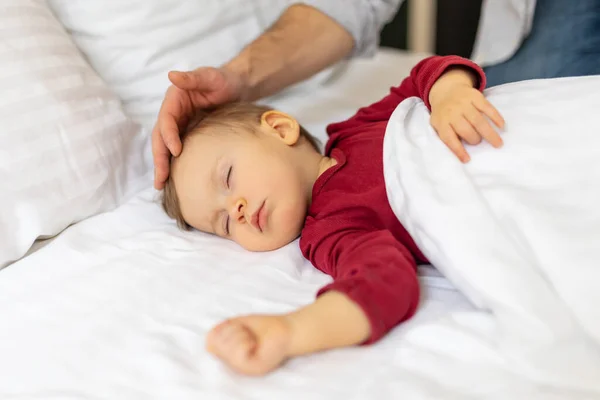Father Touching His Sleeping Baby Tenderly Home Bedroom Interior — Stock Photo, Image