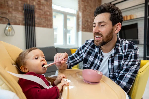 Brunette Father Teaching His Little Baby Eat Porridge Spoon Infant — Stock Photo, Image