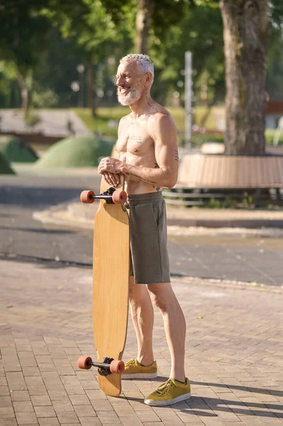 Smiling Mature Man Holding Longboard City Park Active Healthy Lifestyle — Stock Photo, Image