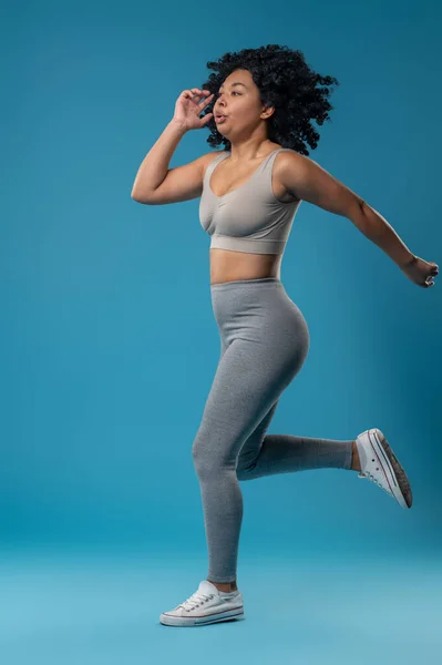 Energized Pretty Woman Grey Sportswear Looking Energized — Stock Photo, Image
