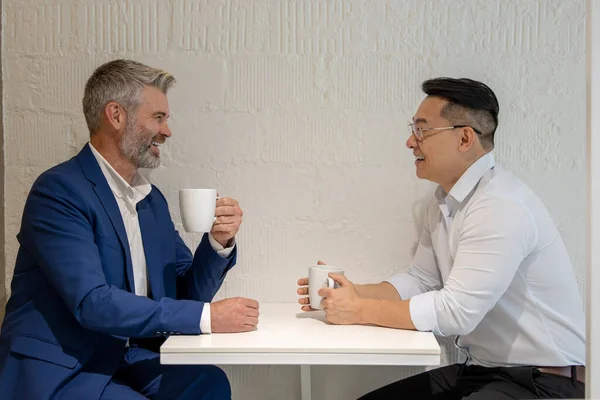 Two Businessman Take Break Drinking Coffee Discussing Business Strategy Office — Stock Photo, Image