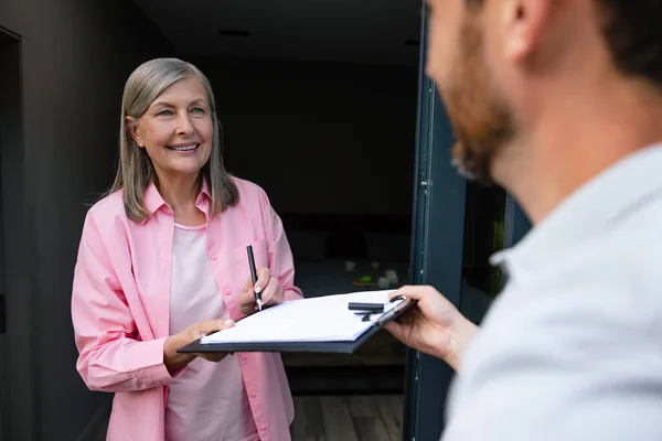 Middle Aged Woman Hand Accepting Delivery Boxes Deliveryman — Stock Photo, Image