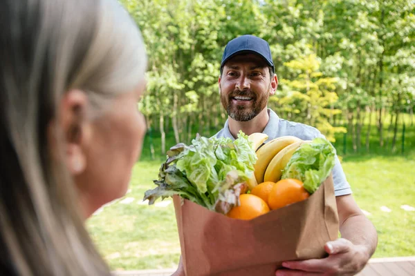 Bearded Delivery Man Handing Food Woman Client — Stock Photo, Image
