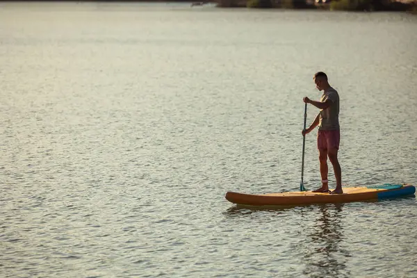 Man Silhouette Supboard Middle Lake Sunset — Stock Photo, Image