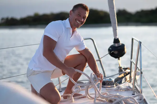 Sailing Smiling Man Yacht Fixing Rope — Stock Photo, Image
