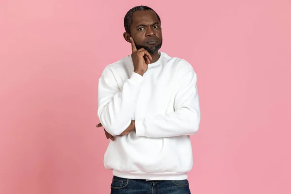 Pensive Black Man Wearing White Sweatshirt Thinking Holding Chin Isolated — Stock Photo, Image