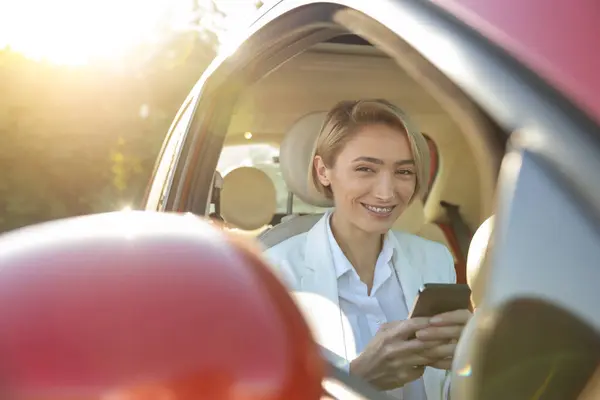 Young Woman Sitting Front Seat Car Using Mobile Phone — Stock Photo, Image