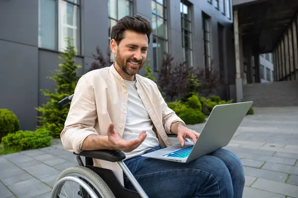 Good News Bearded Man Wheelchair Working Laptop Looking Contented — Stock Photo, Image