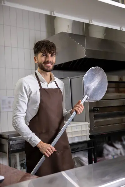 Confident Bearded Man Looking Camera Standing Restaurant Kitchen Wearing Apron — Stock Photo, Image