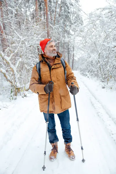 Man Winter Forest Smiling Mature Man Red Hat Snowy Forest — Stock Photo, Image