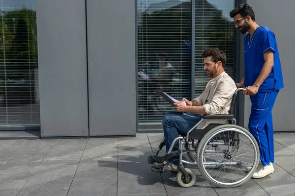Walk Patient Male Nurse Taking Disabled Patient Wheelchair Walk — Stock Photo, Image