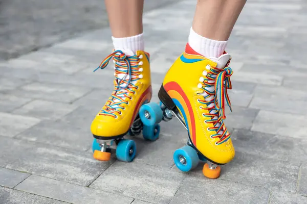 stock image Woman trying on her new rollerblades