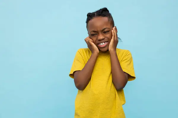 Frustrated African American Little Boy Covering Ears Isolated Blue Background — Stock Photo, Image