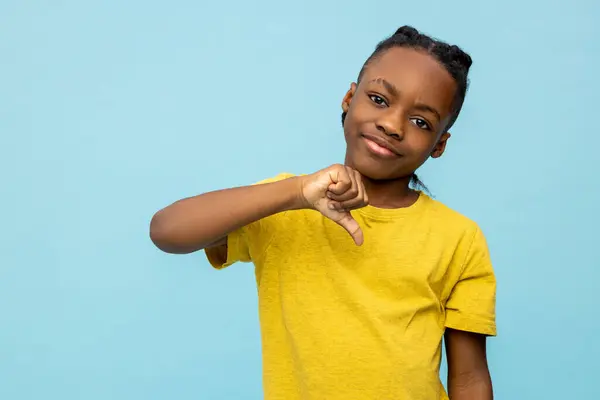 Displeased African American Little Boy Showing Thumb Isolated Blue Background — Stock Photo, Image